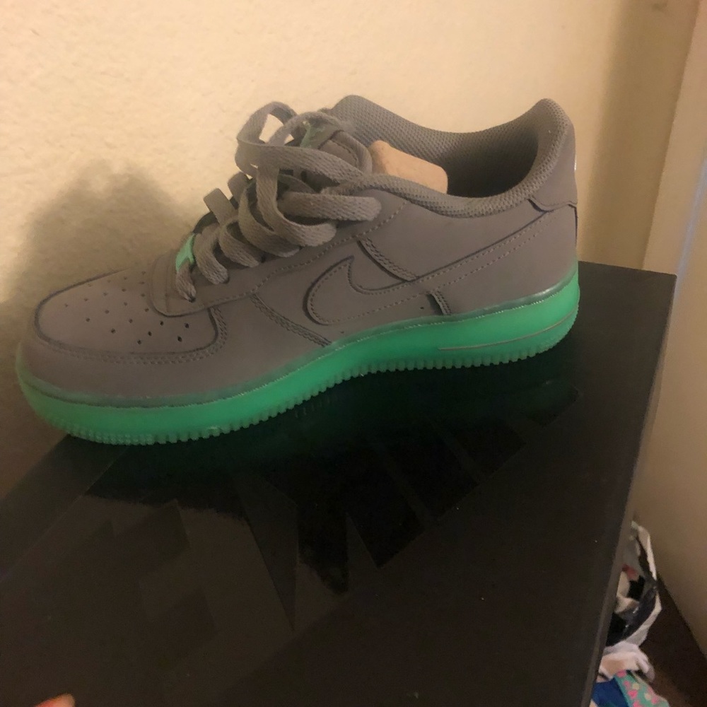 Green and gray Nike